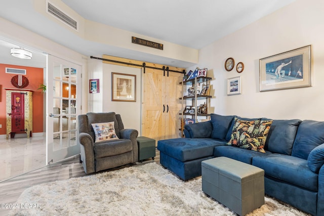 231 Riverside Dr Unit 1803-1, Daytona Beach, FL 32117 - living room with a barn door