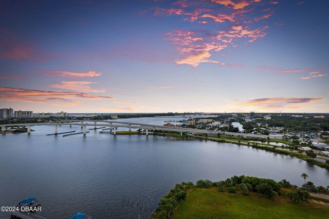 231 Riverside Dr Unit 1803-1, Daytona Beach, FL 32117 - water view with a notable bridge and a dock