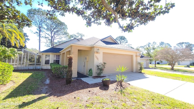 ranch-style home with driveway, glass enclosure, an attached garage, a front yard, and stucco siding