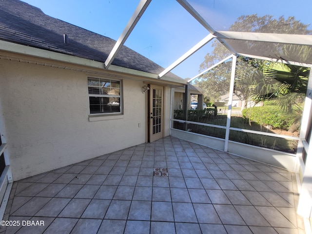 unfurnished sunroom with vaulted ceiling