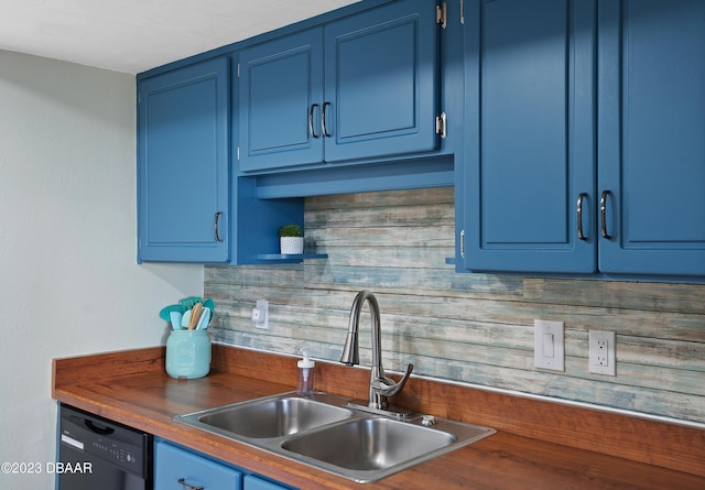 kitchen featuring backsplash, sink, black dishwasher, and blue cabinets