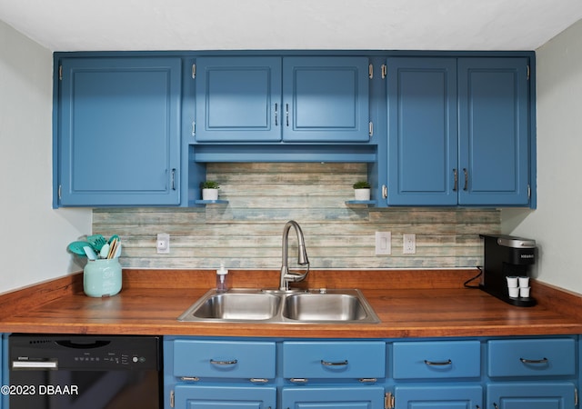 kitchen with blue cabinetry, decorative backsplash, dishwasher, and sink