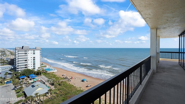 view of water feature with a beach view