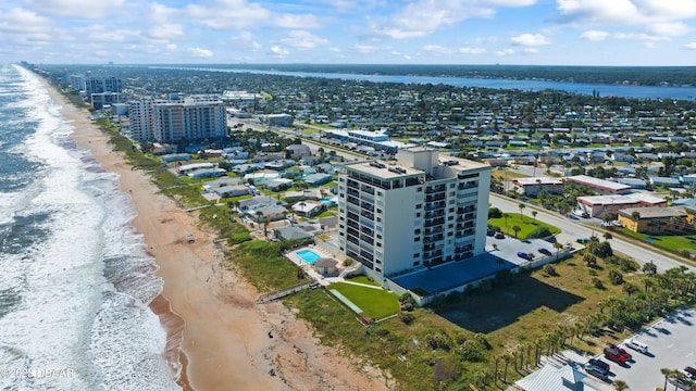 bird's eye view with a view of the beach and a water view