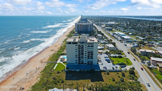 aerial view featuring a water view and a beach view