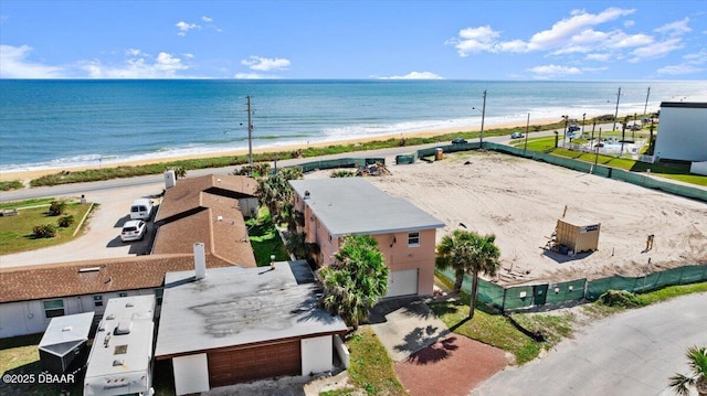 aerial view with a beach view and a water view