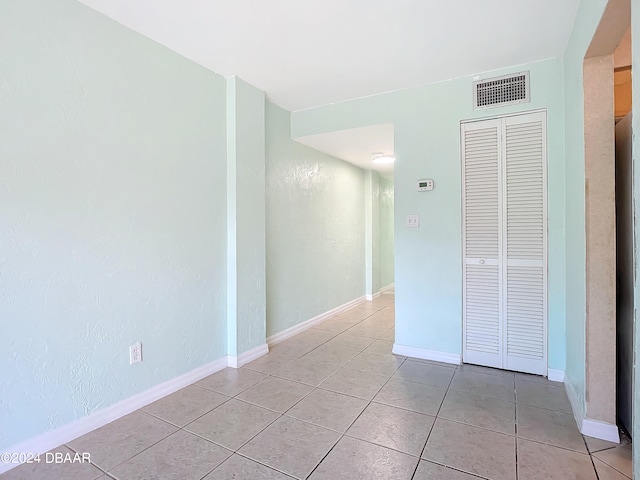 view of tiled empty room