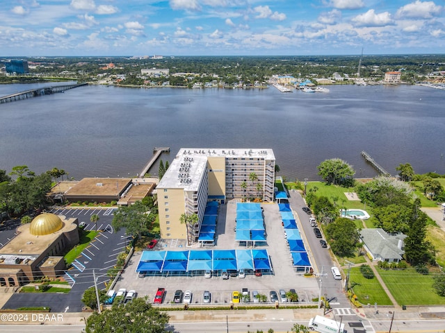 drone / aerial view with a water view