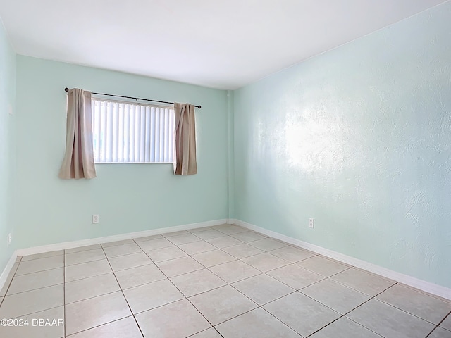 view of tiled spare room