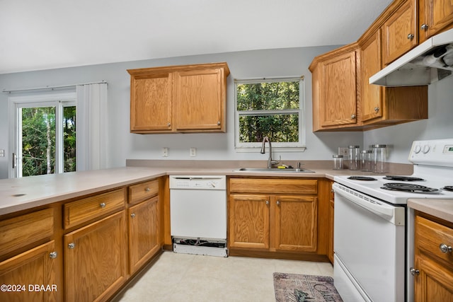 kitchen with white appliances and sink