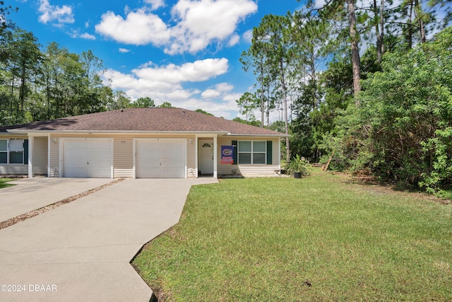 single story home with a garage and a front yard