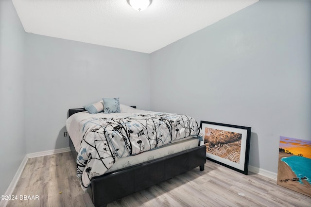 bedroom featuring light wood-type flooring