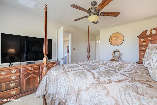 bedroom with ceiling fan and light colored carpet