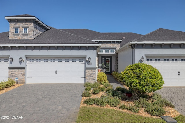 view of front of property featuring a garage