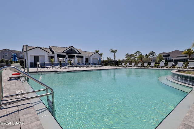 view of pool featuring a patio area