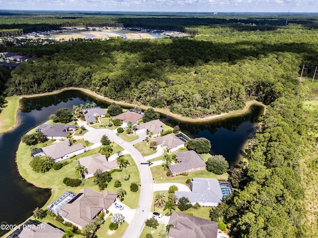 bird's eye view with a water view