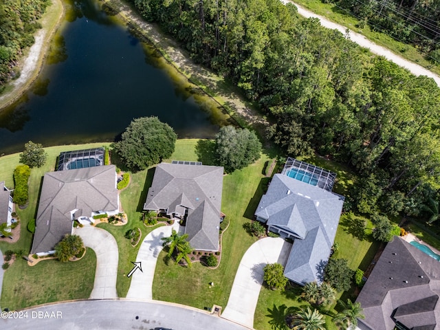 birds eye view of property featuring a water view