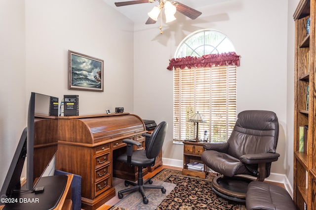 office area with hardwood / wood-style floors, vaulted ceiling, and ceiling fan