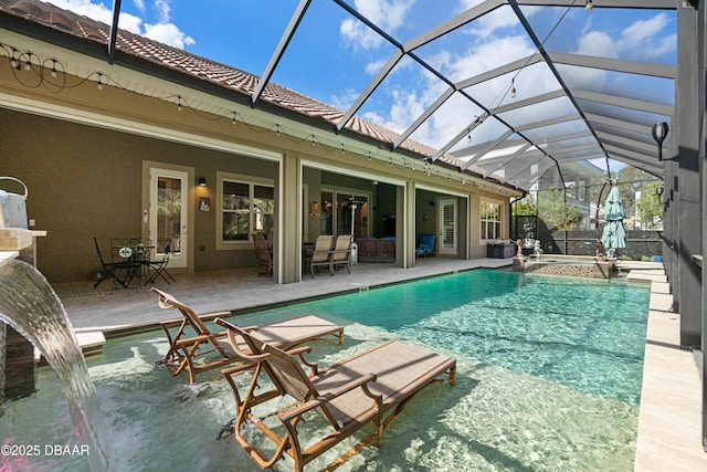 650 Woodbridge Dr, Ormond Beach, FL 32174 - view of pool with a pool with connected hot tub, a patio, and glass enclosure