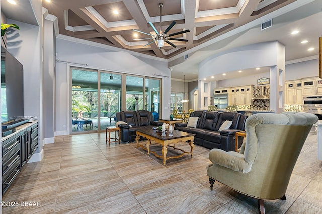 650 Woodbridge Dr, Ormond Beach, FL 32174 - living area featuring a towering ceiling, ornamental molding, a ceiling fan, coffered ceiling, and recessed lighting