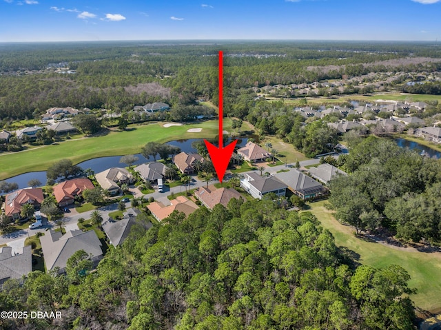 650 Woodbridge Dr, Ormond Beach, FL 32174 - aerial view of property and surrounding area featuring nearby suburban area, a nearby body of water, a golf club, and a heavily wooded area