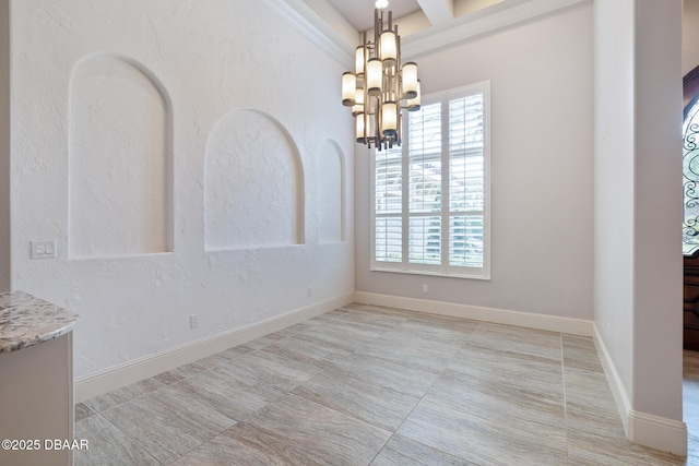 650 Woodbridge Dr, Ormond Beach, FL 32174 - unfurnished dining area featuring healthy amount of natural light, a chandelier, beam ceiling, coffered ceiling, and tile patterned floors