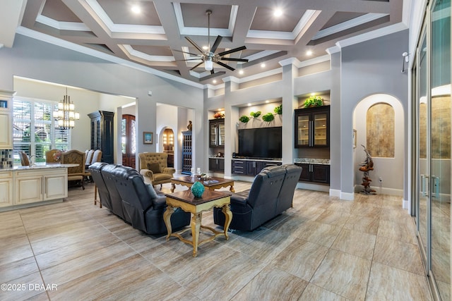 650 Woodbridge Dr, Ormond Beach, FL 32174 - living room featuring a high ceiling, a chandelier, coffered ceiling, crown molding, and beam ceiling