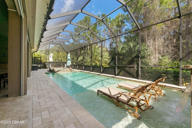 650 Woodbridge Dr, Ormond Beach, FL 32174 - view of swimming pool with a patio area, a pool with connected hot tub, and a lanai