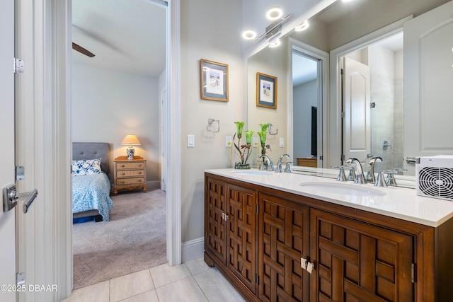 650 Woodbridge Dr, Ormond Beach, FL 32174 - ensuite bathroom with double vanity and tile patterned floors