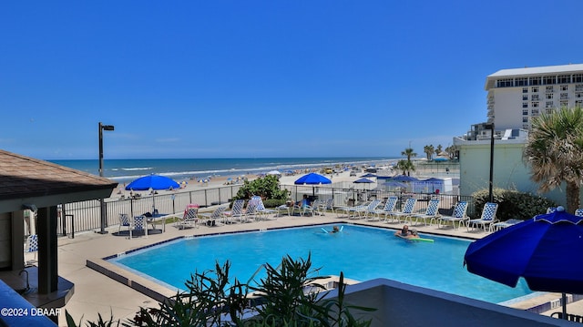 2615 S Atlantic Ave Unit 5C, Daytona Beach Shores, FL 32118 - community pool with a patio, fence, and a water view