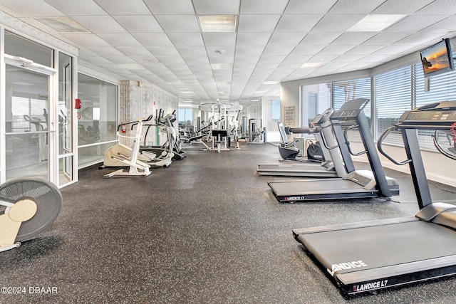 workout area with a drop ceiling