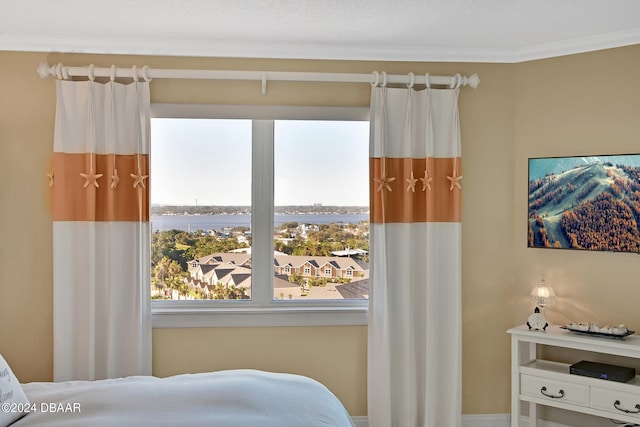 bedroom featuring crown molding