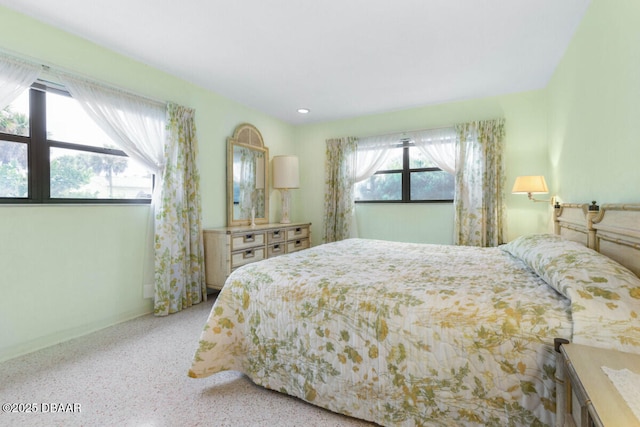 10 Juniper Dr, Ormond Beach, FL 32176 - bedroom with baseboards, speckled floor, and recessed lighting