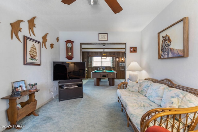 living room with pool table, ceiling fan, and carpet floors