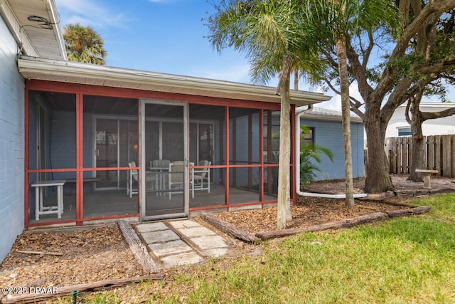 10 Juniper Dr, Ormond Beach, FL 32176 - back of property with a sunroom