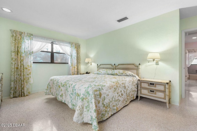 10 Juniper Dr, Ormond Beach, FL 32176 - bedroom featuring dark aggregate flooring, multiple windows, recessed lighting, and baseboards