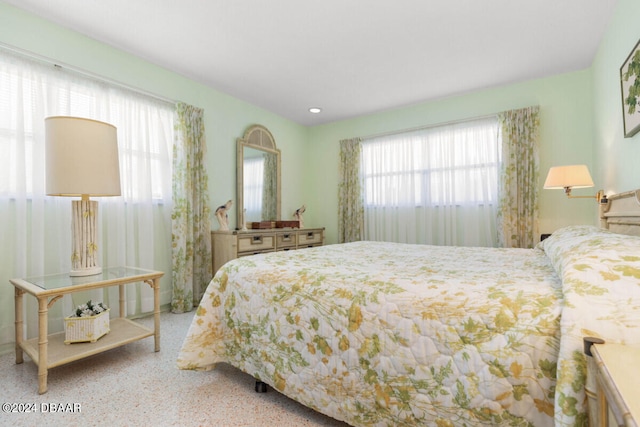 bedroom with light colored carpet