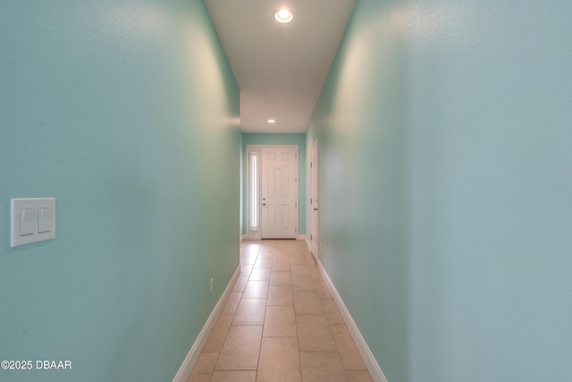 hallway with light tile patterned flooring