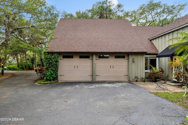 120 Beach St, Ponce Inlet, FL 32127 - garage featuring driveway
