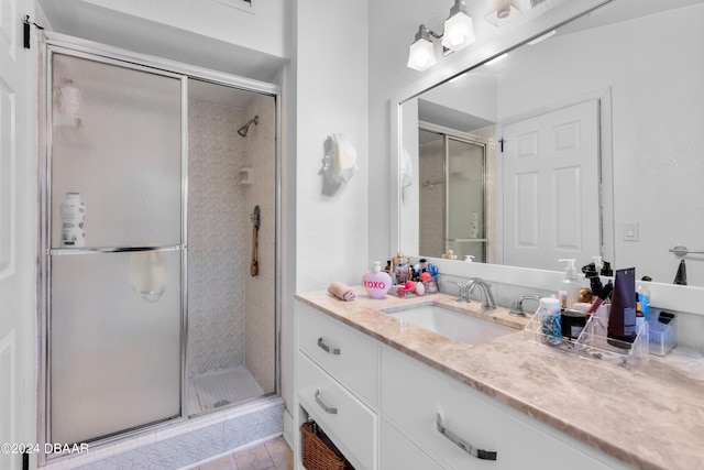 120 Beach St, Ponce Inlet, FL 32127 - bathroom featuring a stall shower and vanity