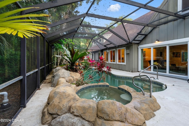 120 Beach St, Ponce Inlet, FL 32127 - view of pool featuring a patio area, a pool with connected hot tub, and a lanai