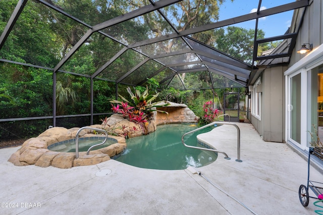 120 Beach St, Ponce Inlet, FL 32127 - view of swimming pool with a pool with connected hot tub, a patio, and glass enclosure