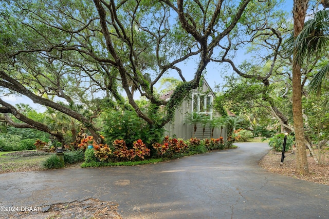 120 Beach St, Ponce Inlet, FL 32127 - view of property exterior featuring driveway