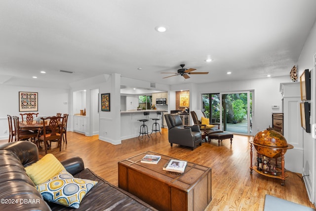 120 Beach St, Ponce Inlet, FL 32127 - living area featuring light wood-type flooring, a ceiling fan, and recessed lighting