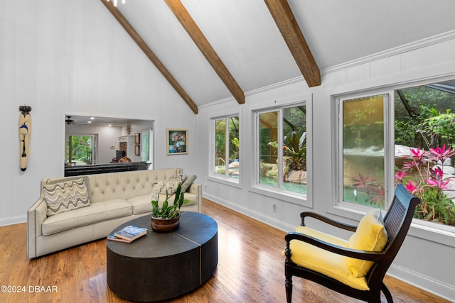 120 Beach St, Ponce Inlet, FL 32127 - living room featuring beamed ceiling, wood finished floors, and high vaulted ceiling