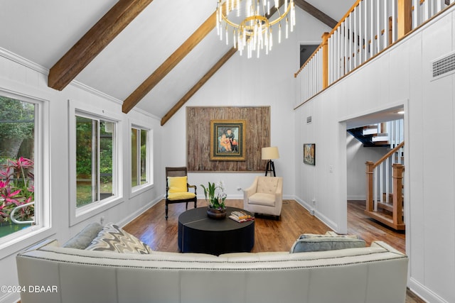 120 Beach St, Ponce Inlet, FL 32127 - living room with high vaulted ceiling, wood finished floors, stairs, beamed ceiling, and a chandelier