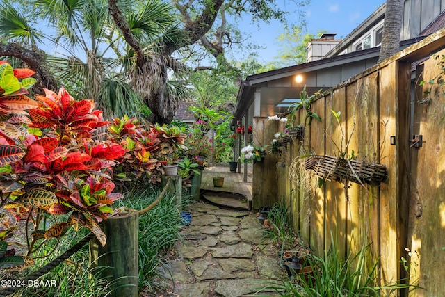 120 Beach St, Ponce Inlet, FL 32127 - view of home's exterior with a chimney