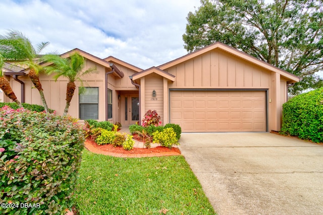 view of front of property with a garage