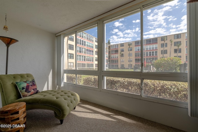 sunroom / solarium featuring plenty of natural light