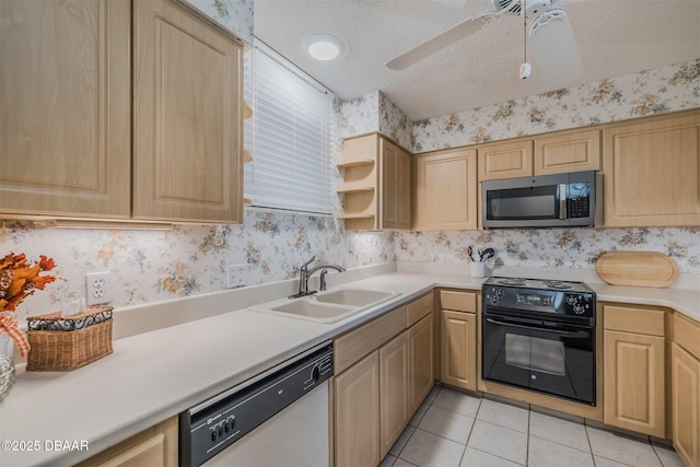 kitchen with dishwashing machine, black electric range, light brown cabinetry, stainless steel microwave, and wallpapered walls